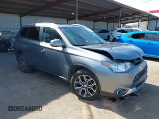 2015 Mitsubishi Outlander GT z VIN JA4JZ4AX1FZ005879, wystawiony jako IAAI lot #41701299 z przebiegiem 212 805 mil mil oraz . Historia ofert i sprzedaży dostępna na DreamBid. Obrazek 1.