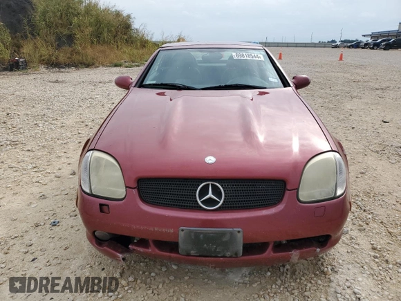 1999 Mercedes-Benz SLK-Class with VIN WDBKK47F0XF132802, listed as a Copart auction lot 69818544 with 123,026 mi miles and Salvage Title. Bid and sale history available at carsss.com. Image 5.