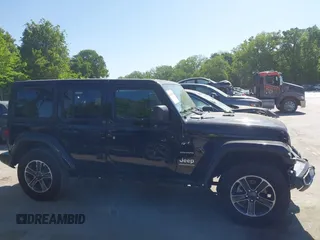2023 Jeep Wrangler Sahara with VIN 1C4HJXEN5PW702268, listed as a IAAI auction lot 42288704 with 57,240 mi miles and . Bid and sale history available at DreamBid. Image 13.