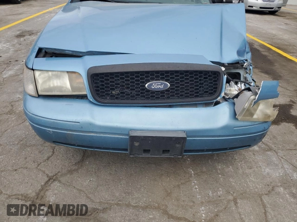 2004 Ford Police Interceptor Base w/3.27 Axle with VIN 2FAFP71W44X176595, listed as a Copart auction lot 72642164 with 136,019 mi miles and Salvage title. Bid and sale history available at DreamBid. Image 11.
