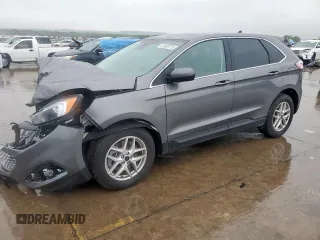 2024 Ford Edge SEL z VIN 2FMPK4J97RBA98092, wystawiony jako Copart lot #52000715 z przebiegiem 23 845 mil mil oraz Szkody całkowita. Historia ofert i sprzedaży dostępna na DreamBid. Obrazek 1.