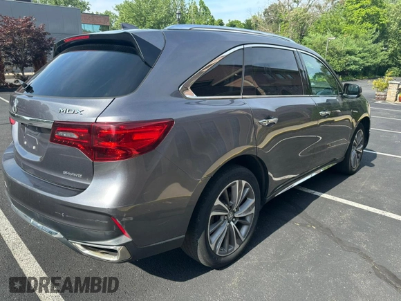 2018 Acura MDX Technology with VIN 5J8YD4H53JL020565, listed as a Copart auction lot 64906135 with 205,899 mi miles and Clean title. Bid and sale history available at DreamBid. Image 3.