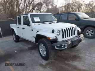 2023 Jeep Gladiator Sport S with VIN 1C6HJTAG3PL528435, listed as a IAAI auction lot 41778363 with 44,286 mi miles and . Bid and sale history available at DreamBid. Image 1.