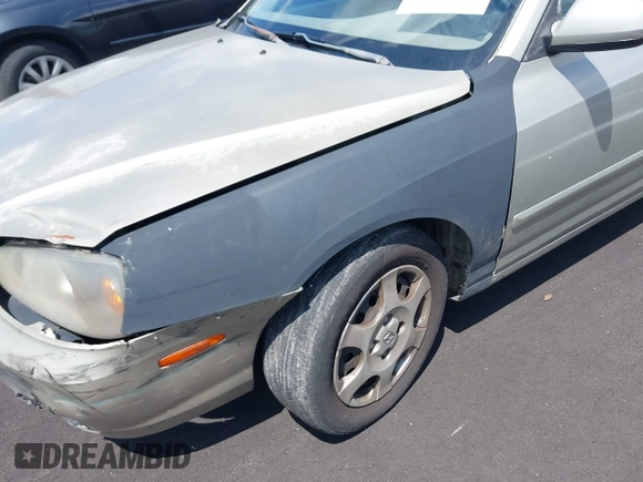 2003 Hyundai Elantra GLS z VIN KMHDN45D83U514659, wystawiony jako IAAI lot #42016920 z przebiegiem 125 673 mil mil oraz . Historia ofert i sprzedaży dostępna na DreamBid. Obrazek 6.