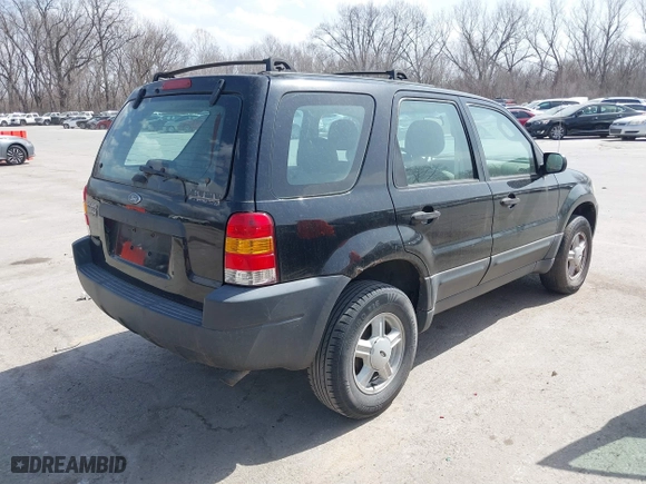 2003 Ford Escape XLS Popular with VIN 1FMYU02153KB46301, listed as a IAAI auction lot 41793418 with 188,184 mi miles. Bid and sale history available at carsss.com. Image 4.