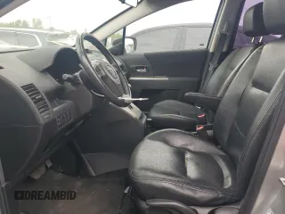 2009 Mazda 5 Grand Touring with VIN JM1CR293390335231, listed as a Copart auction lot 55560285 with 96,502 mi miles and Salvage title. Bid and sale history available at DreamBid. Image 7.