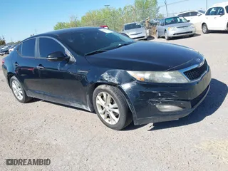 2013 Kia Optima LX with VIN 5XXGM4A72DG141842, listed as a IAAI auction lot 41758919 with 153,114 mi miles. Bid and sale history available at carsss.com. Image 1.