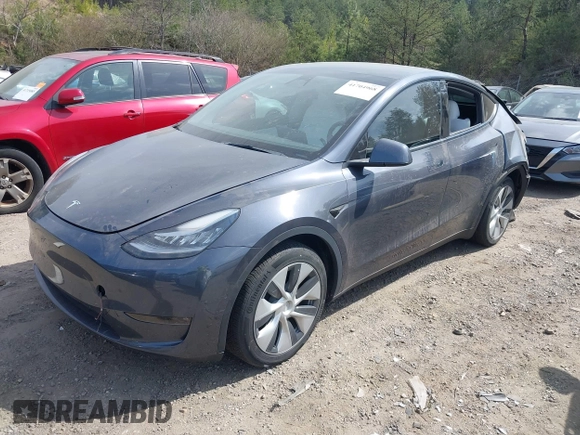 2022 Tesla Model Y Long Range z VIN 7SAYGDEE2NF447998, wystawiony jako IAAI lot #41704968 z przebiegiem 34 088 mil mil oraz . Historia ofert i sprzedaży dostępna na DreamBid. Obrazek 19.