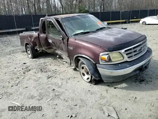 2001 Ford F-150 XL with VIN 1FTZX17211NA94099, listed as a Copart auction lot 50587055 with Not provided miles and Salvage title. Bid and sale history available at DreamBid. Image 10.