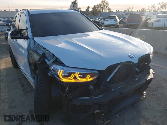 2021 BMW X3 M z VIN 5YMTS0C05M9D03595, wystawiony jako IAAI lot #41324012 z przebiegiem 38 157 mil mil oraz . Historia ofert i sprzedaży dostępna na DreamBid. Obrazek 6.