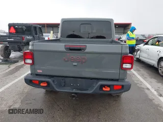 2022 Jeep Gladiator Mojave z VIN 1C6JJTEG8NL130971, wystawiony jako IAAI lot #41163074 z przebiegiem 47 142 mil mil oraz . Historia ofert i sprzedaży dostępna na DreamBid. Obrazek 17.