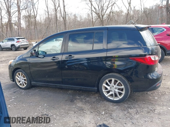 2012 Mazda 5 Touring with VIN JM1CW2CL8C0111574, listed as a IAAI auction lot 41999112 with 126,963 mi miles and . Bid and sale history available at DreamBid. Image 14.