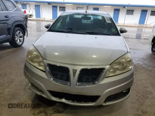2009 Pontiac G6 GT 1SB z VIN 1G2ZK57K694233980, wystawiony jako Copart lot #54146815 z przebiegiem 96 973 mil mil oraz Szkoda całkowita • Salvage title. Historia ofert i sprzedaży dostępna na DreamBid. Obrazek 5.