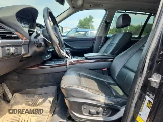 2012 BMW X5 35i with VIN 5UXZV4C5XCL765757, listed as a Copart auction lot 64497535 with 178,836 mi miles and Salvage title. Bid and sale history available at DreamBid. Image 7.