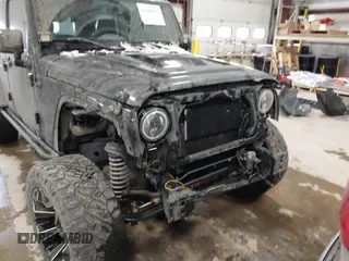 2015 Jeep Wrangler Unlimited Sahara with VIN 1C4BJWEG6FL688382, listed as a IAAI auction lot 41620621 with 138,119 mi miles. Bid and sale history available at carsss.com. Image 6.
