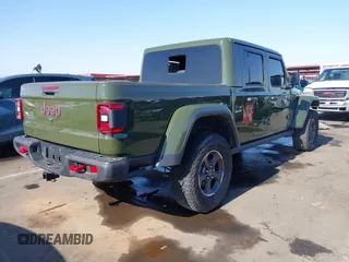 2022 Jeep Gladiator Rubicon z VIN 1C6JJTBG1NL163699, wystawiony jako IAAI lot #41014300 z przebiegiem Nie podano mil oraz . Historia ofert i sprzedaży dostępna na DreamBid. Obrazek 4.