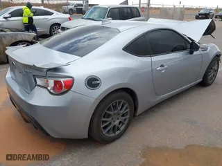 2015 Subaru BRZ Limited with VIN JF1ZCAC11F9606443, listed as a IAAI auction lot 41798257 with 105,465 mi miles. Bid and sale history available at carsss.com. Image 4.