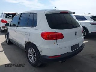 2014 Volkswagen Tiguan SEL with VIN WVGAV3AX0EW524669, listed as a IAAI auction lot 42289003 with 94,513 mi miles and . Bid and sale history available at DreamBid. Image 3.