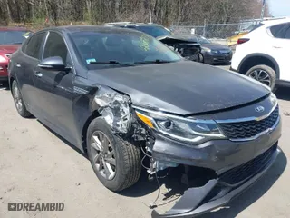 2019 Kia Optima LX with VIN 5XXGT4L35KG306244, listed as a IAAI auction lot 42068277 with 83,843 mi miles. Bid and sale history available at carsss.com. Image 1.