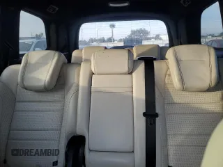 2015 Mercedes-Benz GL with VIN 4JGDF7EE5FA486574, listed as a Copart auction lot 86883394 with 74,698 mi miles and Clean Title. Bid and sale history available at carsss.com. Image 10.
