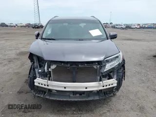 2019 Honda Pilot Touring 8-Passenger with VIN 5FNYF5H93KB028641, listed as a IAAI auction lot 42524078 with 56,744 mi miles and . Bid and sale history available at DreamBid. Image 13.