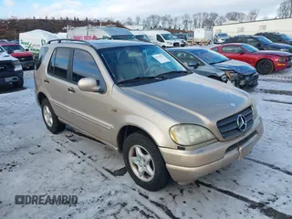 2001 Mercedes-Benz M-Class with VIN 4JGAB54E91A271230, listed as a IAAI auction lot 41519970 with 229,773 mi miles. Bid and sale history available at carsss.com. Image 1.