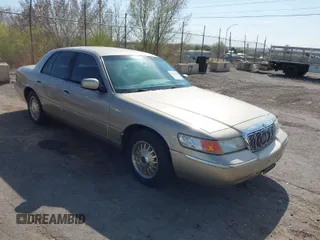 1999 Mercury Grand Marquis LS with VIN 2MEFM75W2XX716753, listed as a IAAI auction lot 41980228 with 135,094 mi miles and . Bid and sale history available at DreamBid. Image 1.