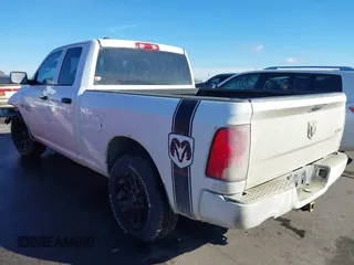 2014 Ram 1500 Express with VIN 1C6RR7FTXES119572, listed as a IAAI auction lot 41655142 with 143,232 mi miles. Bid and sale history available at carsss.com. Image 3.