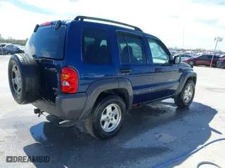 2003 Jeep Liberty Sport with VIN 1J4GL48K73W580572, listed as a IAAI auction lot 41846727 with 183,553 mi miles. Bid and sale history available at carsss.com. Image 4.