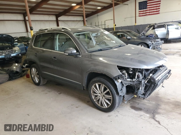 2015 Volkswagen Tiguan SE z VIN WVGBV7AX0FW588451, wystawiony jako Copart lot #51005345 z przebiegiem 104 553 mil mil oraz Szkoda całkowita • Salvage title. Historia ofert i sprzedaży dostępna na DreamBid. Obrazek 4.