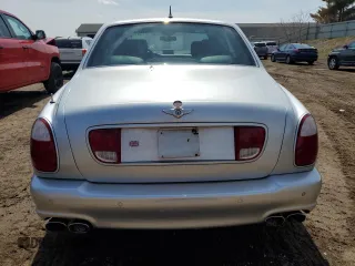 2004 Bentley Arnage z VIN SCBLF34F44CX09923, wystawiony jako Copart lot #52712015 z przebiegiem Nie podano mil oraz Tytuł czysty. Historia ofert i sprzedaży dostępna na DreamBid. Obrazek 6.