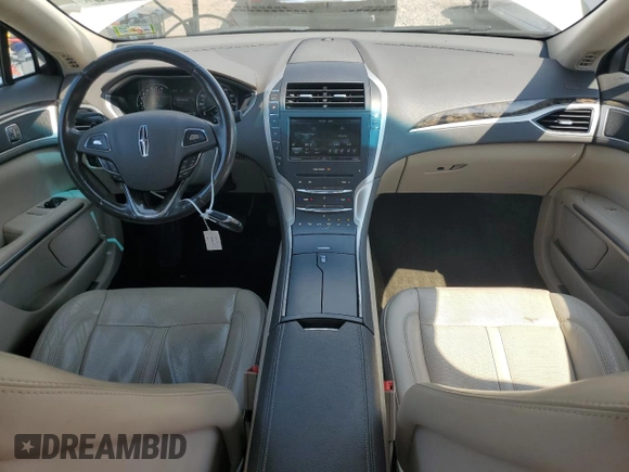 2016 Lincoln MKZ z VIN 3LN6L2J99GR620863, wystawiony jako Copart lot #59547725 z przebiegiem 121 607 mil mil oraz Szkoda całkowita • Salvage title. Historia ofert i sprzedaży dostępna na DreamBid. Obrazek 8.