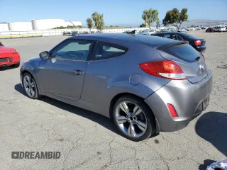 2012 Hyundai Veloster w/Gray Int z VIN KMHTC6AD9CU079542, wystawiony jako Copart lot #55998045 z przebiegiem 98 065 mil mil oraz Szkoda całkowita • Salvage title. Historia ofert i sprzedaży dostępna na DreamBid. Obrazek 2.