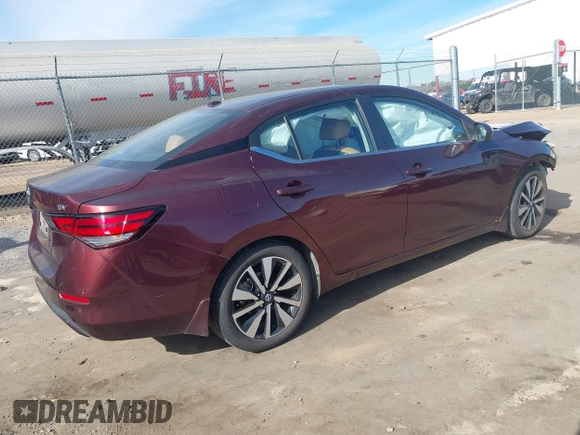 2022 Nissan Sentra SV z VIN 3N1AB8CV5NY221159, wystawiony jako IAAI lot #41322470 z przebiegiem 27 098 mil mil oraz . Historia ofert i sprzedaży dostępna na DreamBid. Obrazek 4.