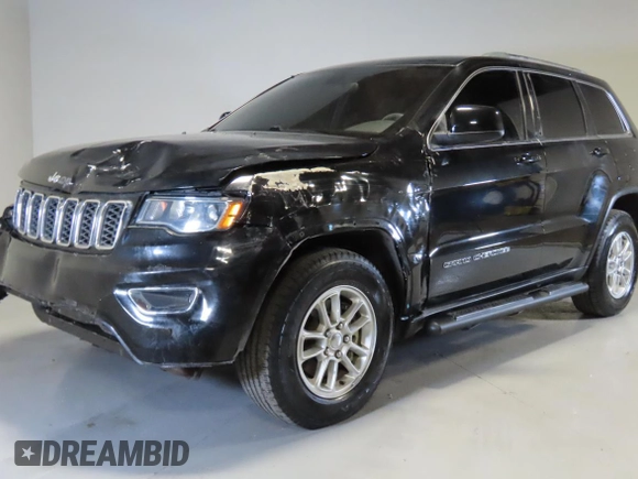 2018 Jeep Grand Cherokee Laredo E with VIN 1C4RJEAG0JC513620, listed as a Copart auction lot 58666915 with 67,654 mi miles and Clean title. Bid and sale history available at DreamBid. Image 2.