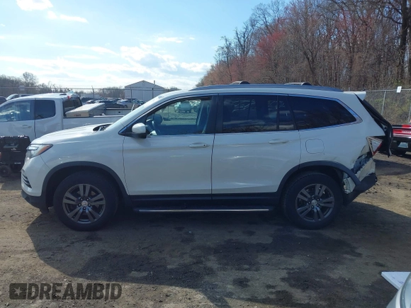 2017 Honda Pilot EX-L z VIN 5FNYF6H71HB061036, wystawiony jako IAAI lot #41891446 z przebiegiem 194 566 mil mil oraz . Historia ofert i sprzedaży dostępna na DreamBid. Obrazek 14.
