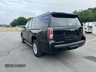 2016 GMC Yukon XL SLT with VIN 1GKS2GKC2GR180580, listed as a Copart auction lot 66899234 with 243,232 mi miles and Clean Title. Bid and sale history available at carsss.com. Image 2.