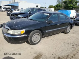 1998 Lincoln Continental with VIN 1LNFM97V8WY742639, listed as a Copart auction lot 82138303 with 268,814 mi miles and Salvage Title. Bid and sale history available at carsss.com. Image 1.