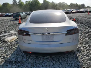 2017 Tesla Model S 60 with VIN 5YJSA1E15HF203248, listed as a Copart auction lot 54923855 with 84,214 mi miles and Salvage title. Bid and sale history available at DreamBid. Image 6.