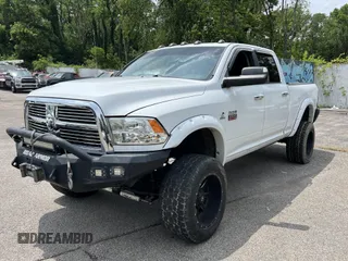 2012 Ram 2500 Laramie z VIN 3C6UD5FL6CG139061, wystawiony jako IAAI lot #42799042 z przebiegiem 257 757 mil mil oraz . Historia ofert i sprzedaży dostępna na DreamBid. Obrazek 2.