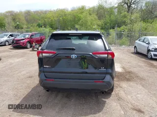 2021 Toyota RAV4 Hybrid LE with VIN 2T3L6RFV7MW011159, listed as a IAAI auction lot 42212998 with 104,626 mi miles and . Bid and sale history available at DreamBid. Image 16.
