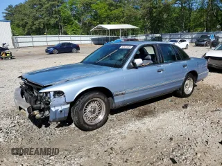 1997 Ford Crown Victoria LX z VIN 2FALP74W1VX218463, wystawiony jako Copart lot #52851045 z przebiegiem 236 098 mil mil oraz Szkoda całkowita • Salvage title. Historia ofert i sprzedaży dostępna na DreamBid. Obrazek 1.