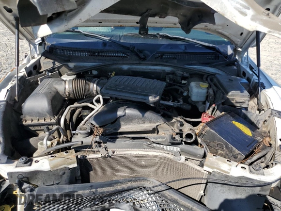 2008 Mitsubishi Raider LS z VIN 1Z7HC22K58S572156, wystawiony jako Copart lot #72398984 z przebiegiem 171 035 mil mil oraz Szkoda całkowita • Salvage title. Historia ofert i sprzedaży dostępna na DreamBid. Obrazek 11.