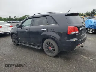 2012 Kia Sorento SX with VIN 5XYKWDA21CG213651, listed as a Copart auction lot 60831745 with 227,817 mi miles and Clean title. Bid and sale history available at DreamBid. Image 2.