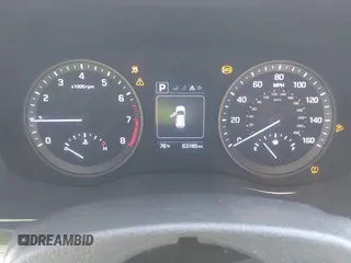 2016 Hyundai Tucson SE z VIN KM8J23A48GU212421, wystawiony jako IAAI lot #42072562 z przebiegiem 63 745 mil mil oraz . Historia ofert i sprzedaży dostępna na DreamBid. Obrazek 7.