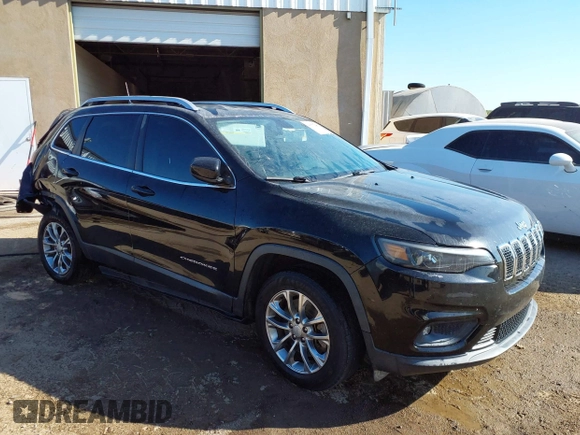 2019 Jeep Cherokee Latitude Plus with VIN 1C4PJLLB3KD223431, listed as a IAAI auction lot 40377530 with 123,575 mi miles. Bid and sale history available at carsss.com. Image 1.