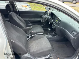 2007 Hyundai Accent SE with VIN KMHCN36C47U005847, listed as a Copart auction lot 46369725 with 148,790 mi miles and Clean Title. Bid and sale history available at carsss.com. Image 5.
