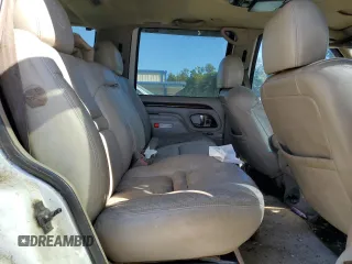 1999 Cadillac Escalade z VIN 1GYEK13R8XR411548, wystawiony jako Copart lot #75803424 z przebiegiem 277 712 mil mil oraz Szkody całkowita. Historia ofert i sprzedaży dostępna na DreamBid. Obrazek 12.