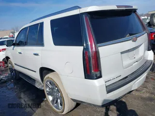 2017 Cadillac Escalade z VIN 1GYS4AKJ9HR233577, wystawiony jako IAAI lot #41524641 z przebiegiem 126 299 mil mil oraz . Historia ofert i sprzedaży dostępna na DreamBid. Obrazek 3.