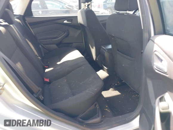 2018 Ford Focus SE z VIN 1FADP3FE3JL220529, wystawiony jako IAAI lot #41564216 z przebiegiem 16 883 mil mil oraz . Historia ofert i sprzedaży dostępna na DreamBid. Obrazek 8.